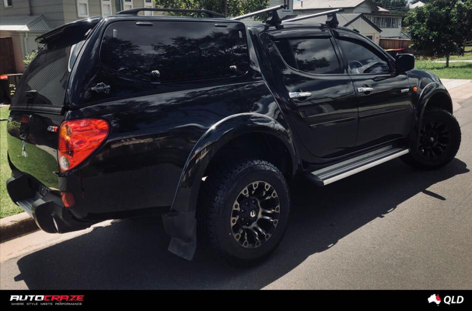 MITSUBISHI TRITON VAPOR BLACK MACHINED WITH DARK TINT